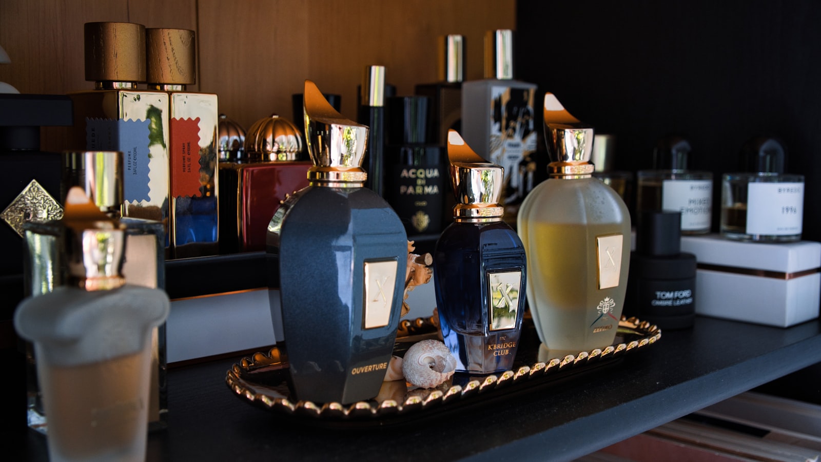 Collection of perfume bottles arranged on a shelf, illustrating Chogan's numbered fragrance catalogue